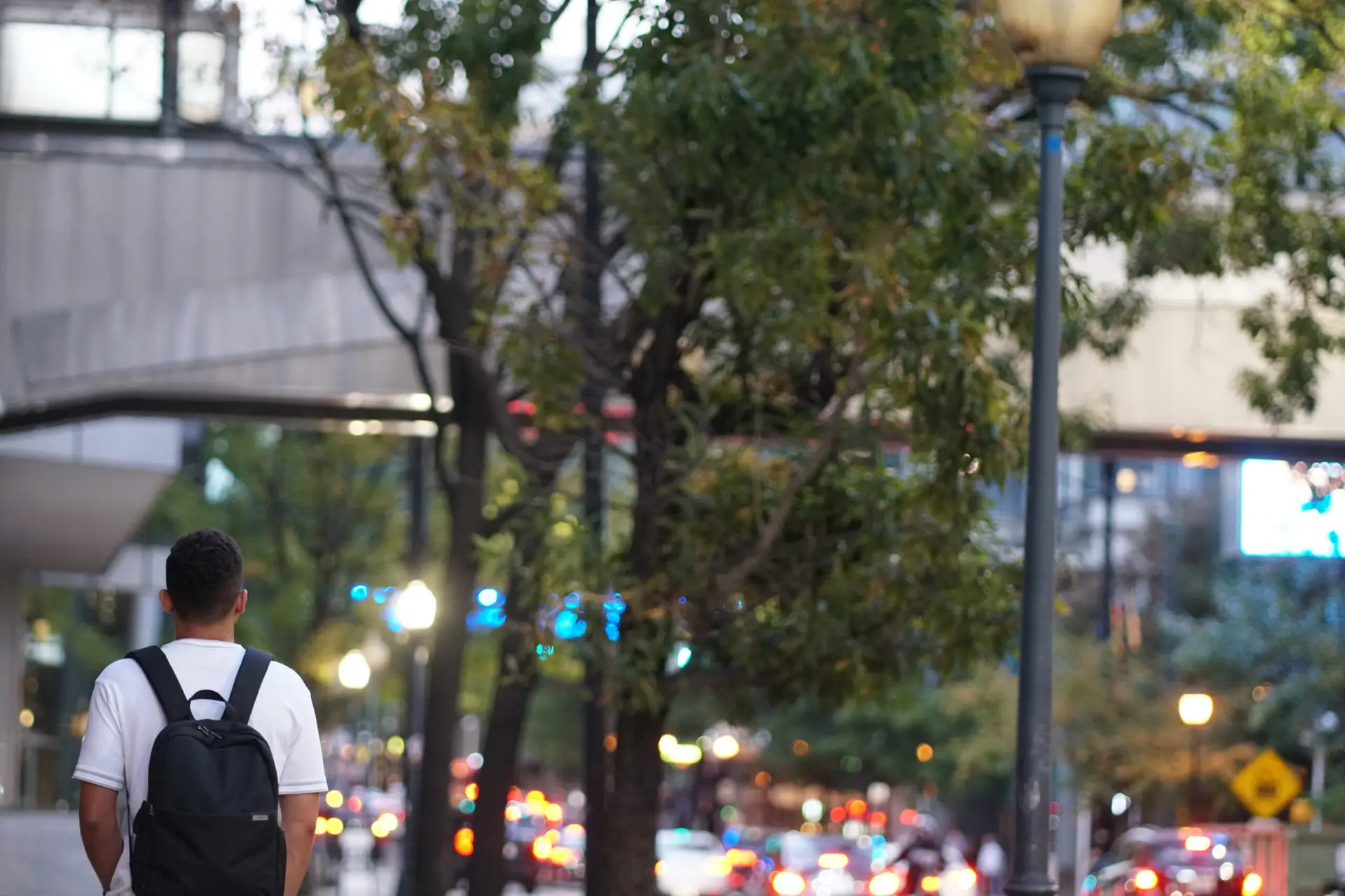 Stephen Walking Down the Sidewalk in the City