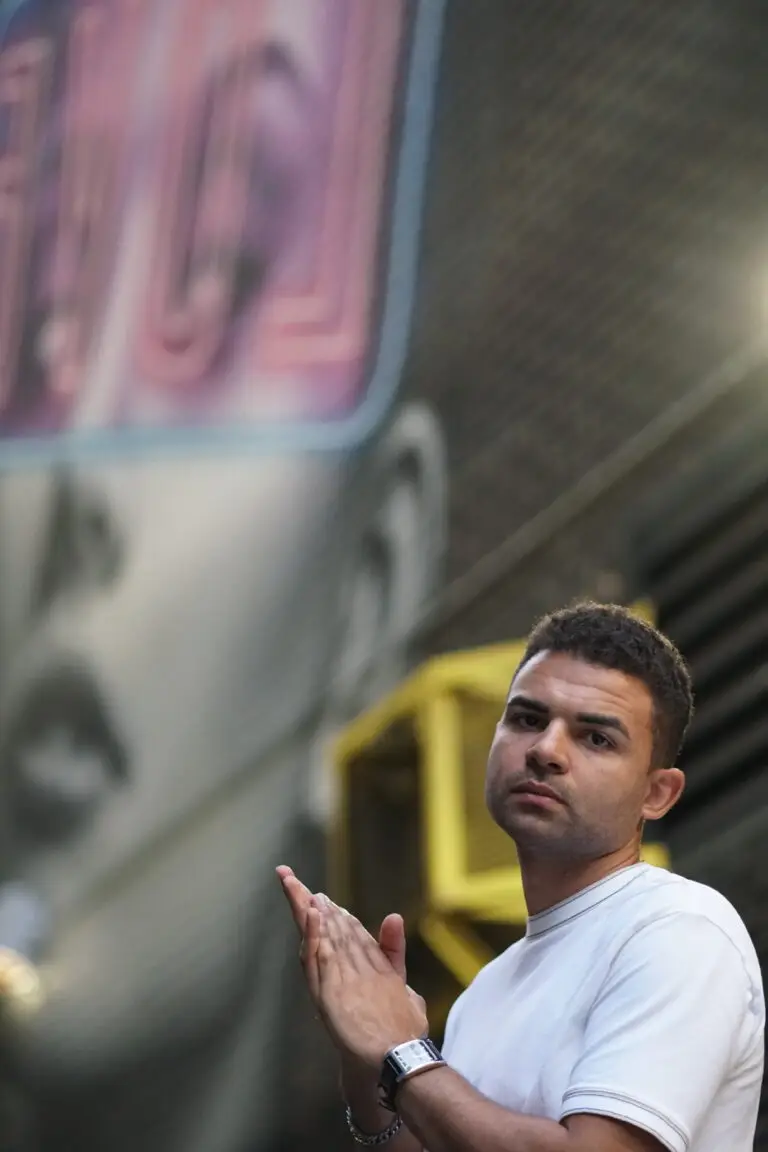 Stephen Hammonds standing against the backdrop of a building.